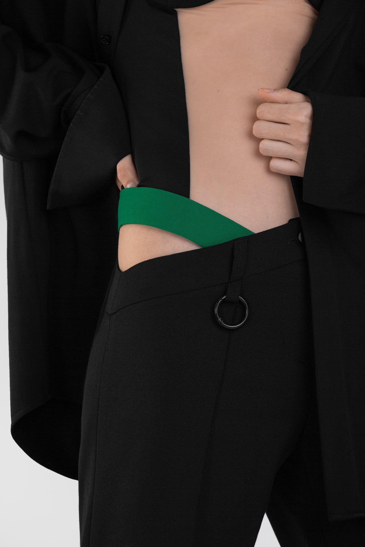 ASYMMETRICAL WAIST TROUSERS