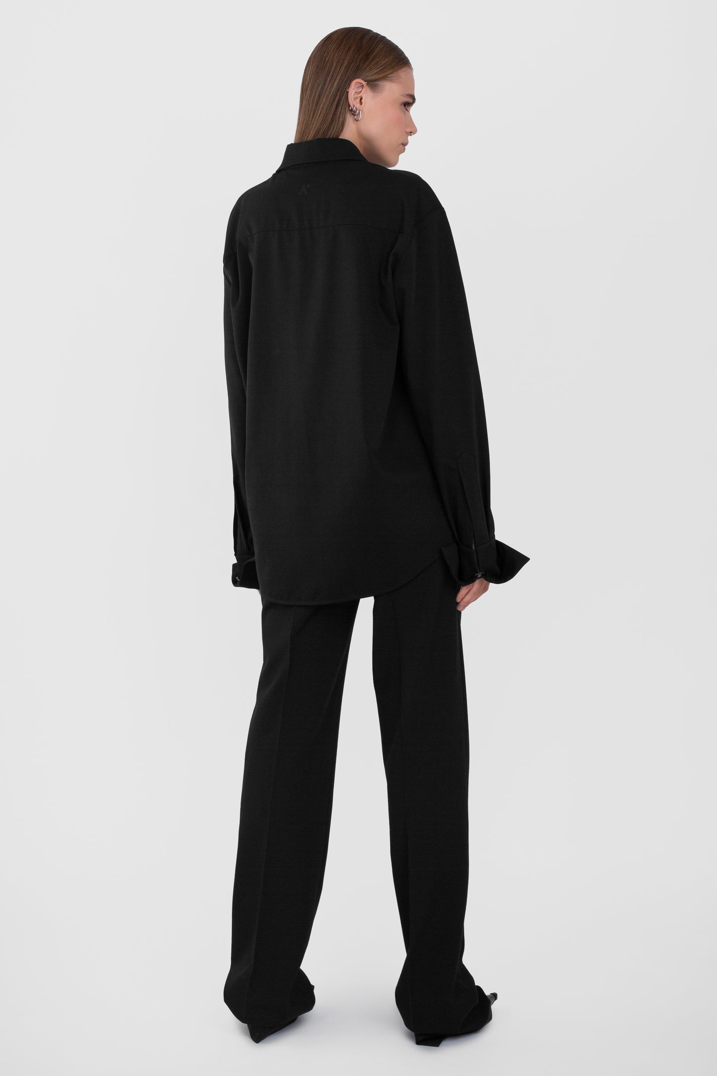 ASYMMETRICAL WAIST TROUSERS