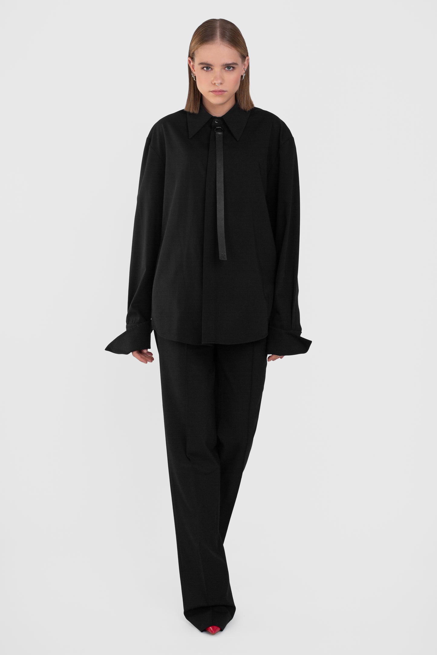 ASYMMETRICAL WAIST TROUSERS