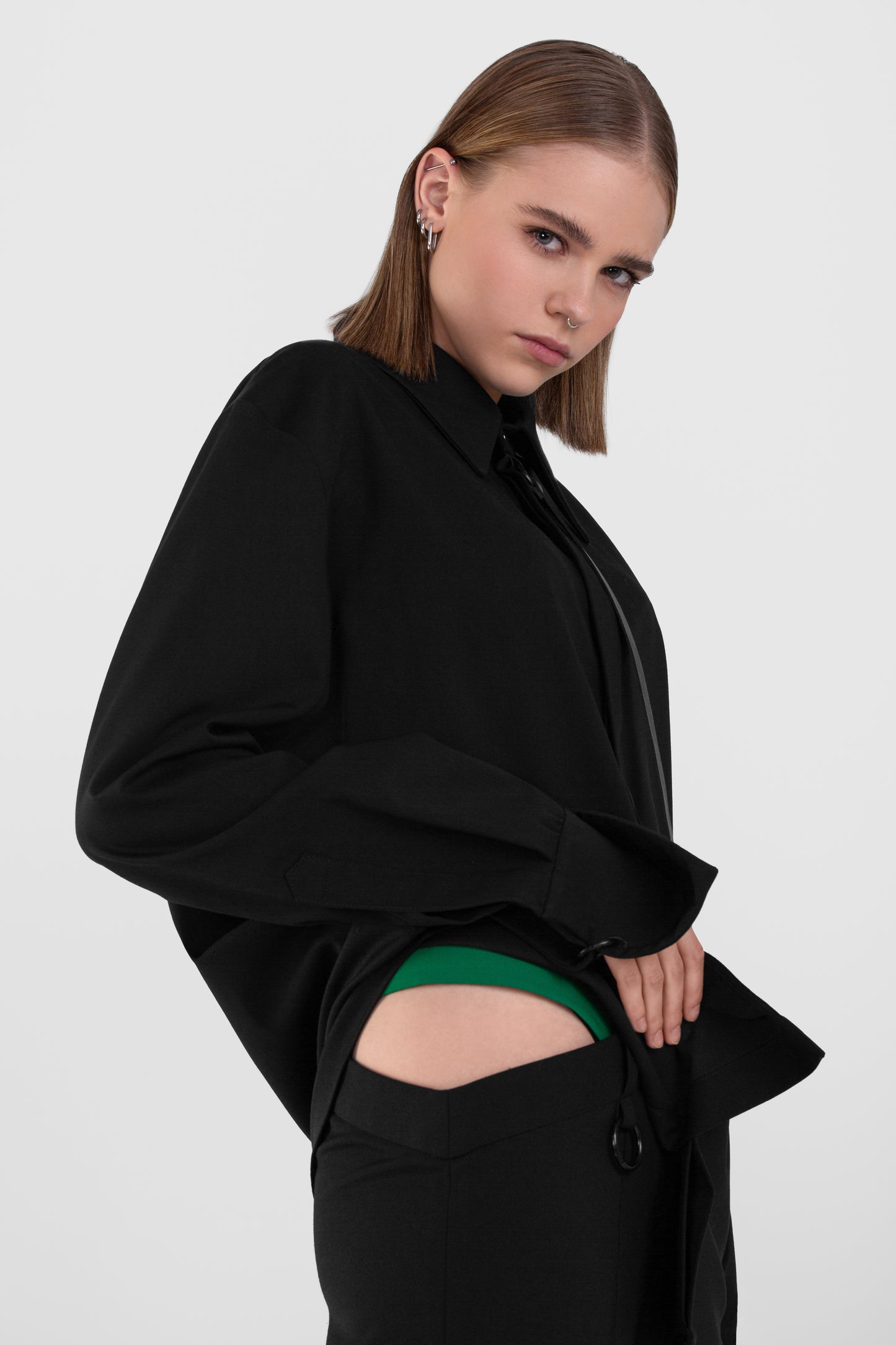 ASYMMETRICAL WAIST TROUSERS